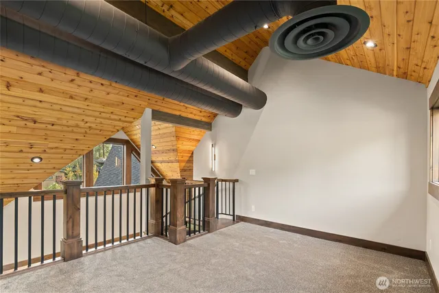 a view of a porch with wooden floor