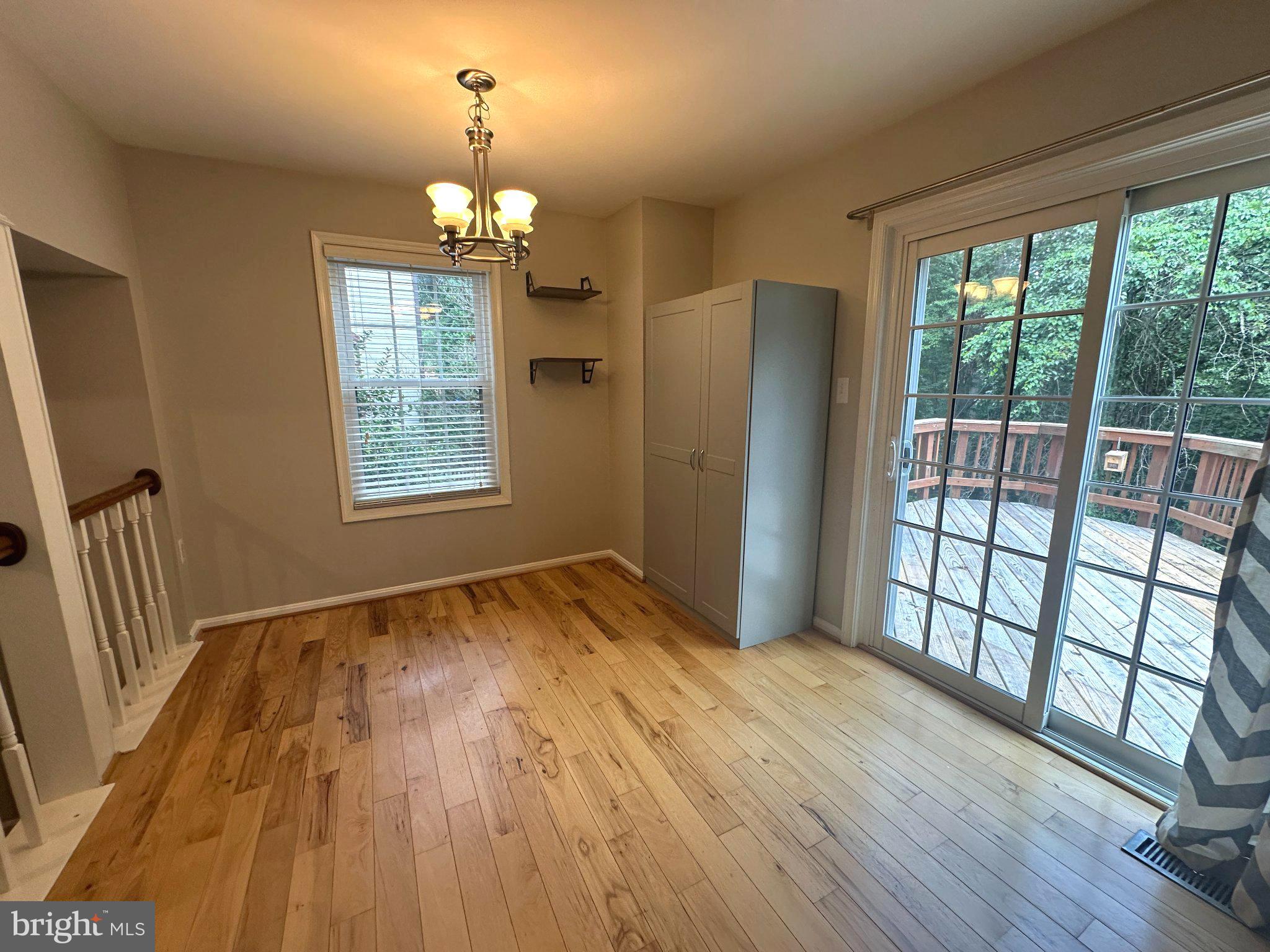 11928 Sentinel Point Court Reston, VA 20191 - Photo 11 of 23 Bright and airy space with deck access.