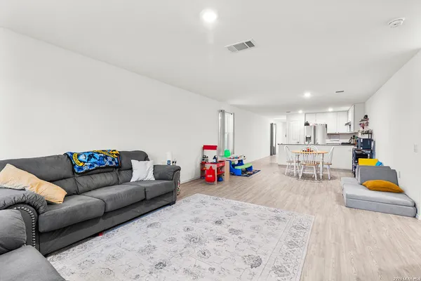 a living room with furniture and a couch
