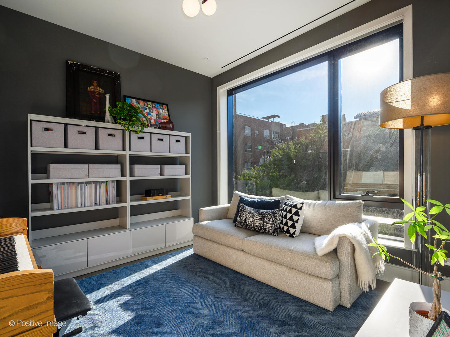 21 North May Street, Unit 305 Chicago, IL 60607 - Photo 14 of 38 a living room with furniture and a floor to ceiling window