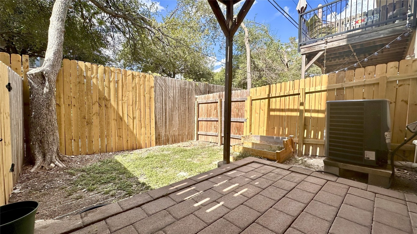 13420 Lyndhurst Street, Unit 304 Austin, TX 78717 - Photo 14 of 17 a view of backyard with tub