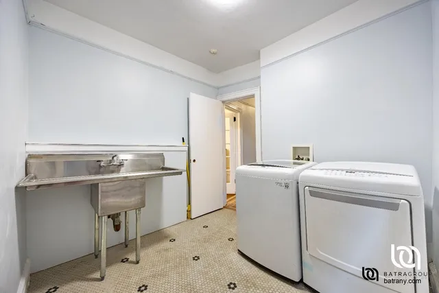 a utility room with dryer and washer