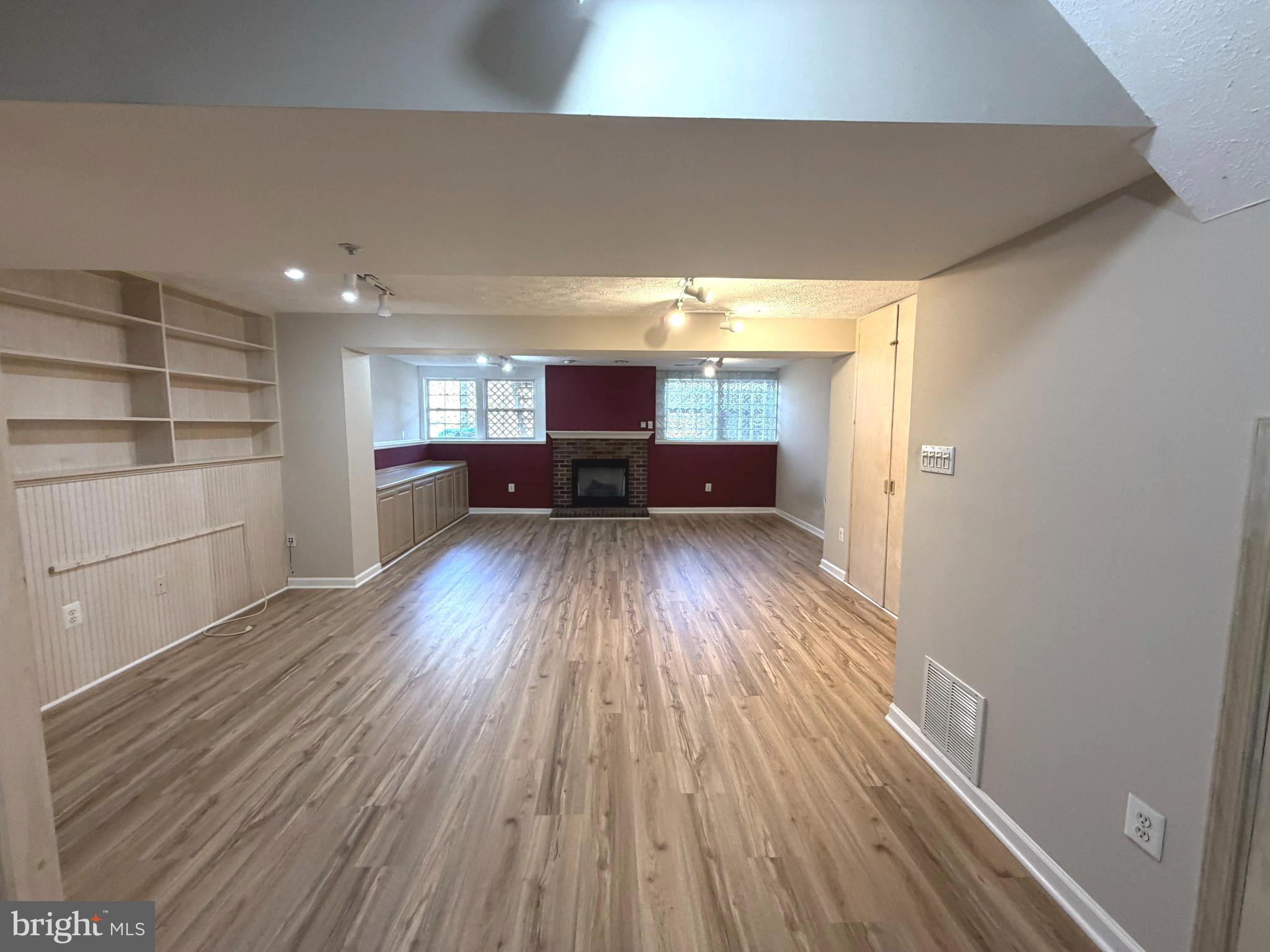 1601 Coopers Way Frederick, MD 21701 - Photo 23 of 31 Very spacious finished lower level w/gas fireplace