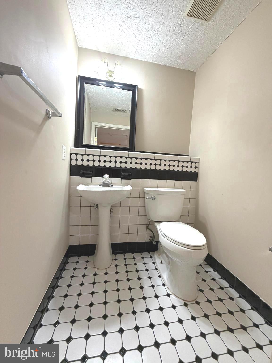 1601 Coopers Way Frederick, MD 21701 - Photo 27 of 31 powder room on lower level