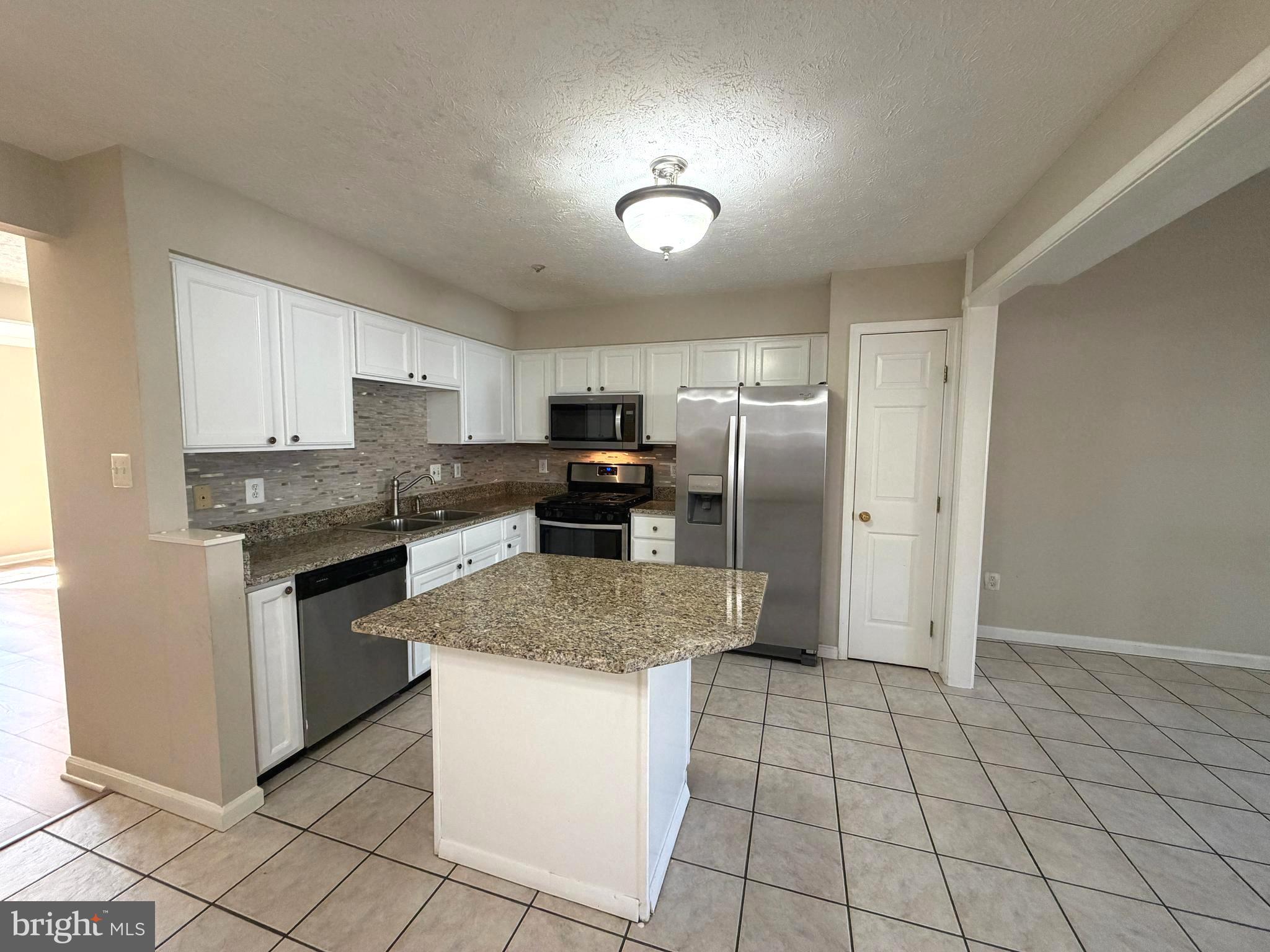 1601 Coopers Way Frederick, MD 21701 - Photo 8 of 31 new granite and backsplash, SS appliances