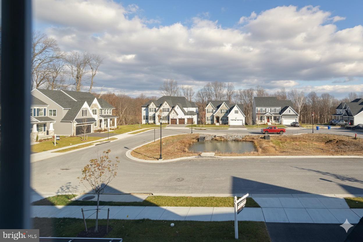 1817 Colt Lane Frederick, MD 21702 - Photo 39 of 43 a view of a swimming pool with an outdoor seating