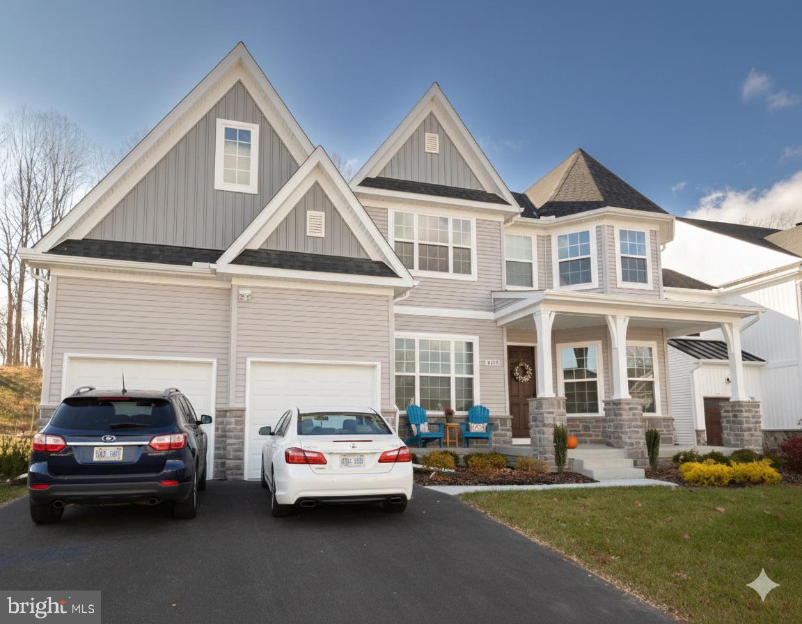 1817 Colt Lane Frederick, MD 21702 - Photo 43 of 43 a car parked in front of a house