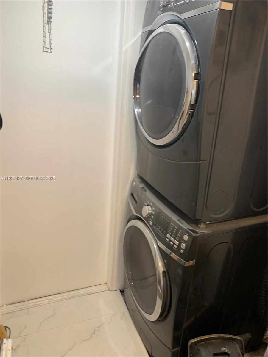 14301 Southwest 105th Avenue Miami, FL 33176 - Photo 11 of 15 a utility room with dryer and washer