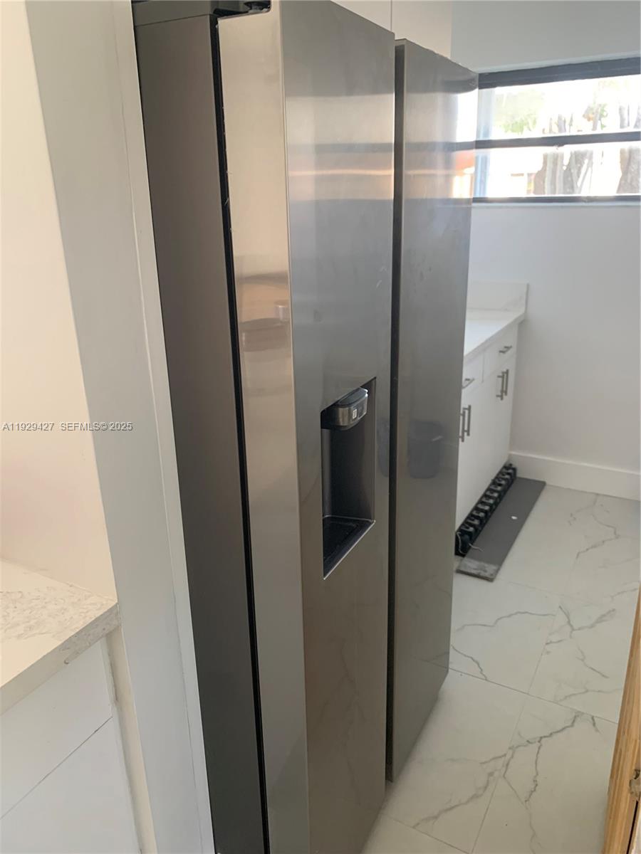 14301 Southwest 105th Avenue Miami, FL 33176 - Photo 3 of 15 a bathroom with a shower and a mirror