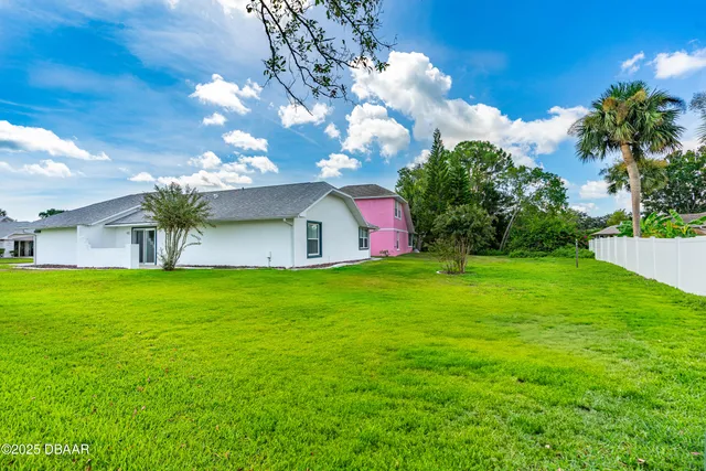 a front view of house with garden