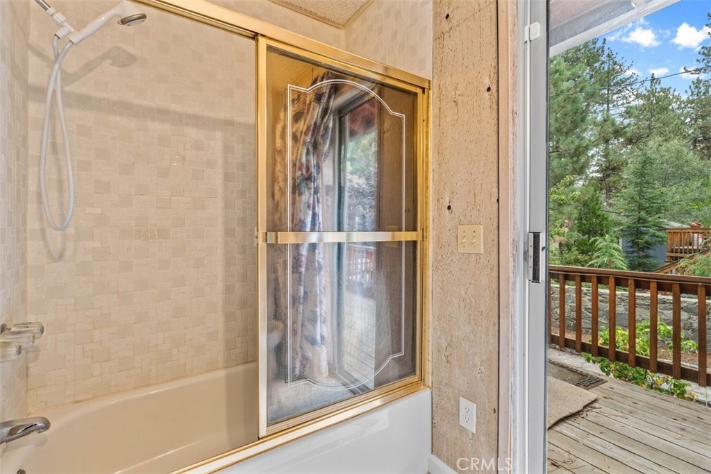 1056 Lark Road Wrightwood, CA 92397 - Photo 24 of 40 a view of a balcony with wooden floor