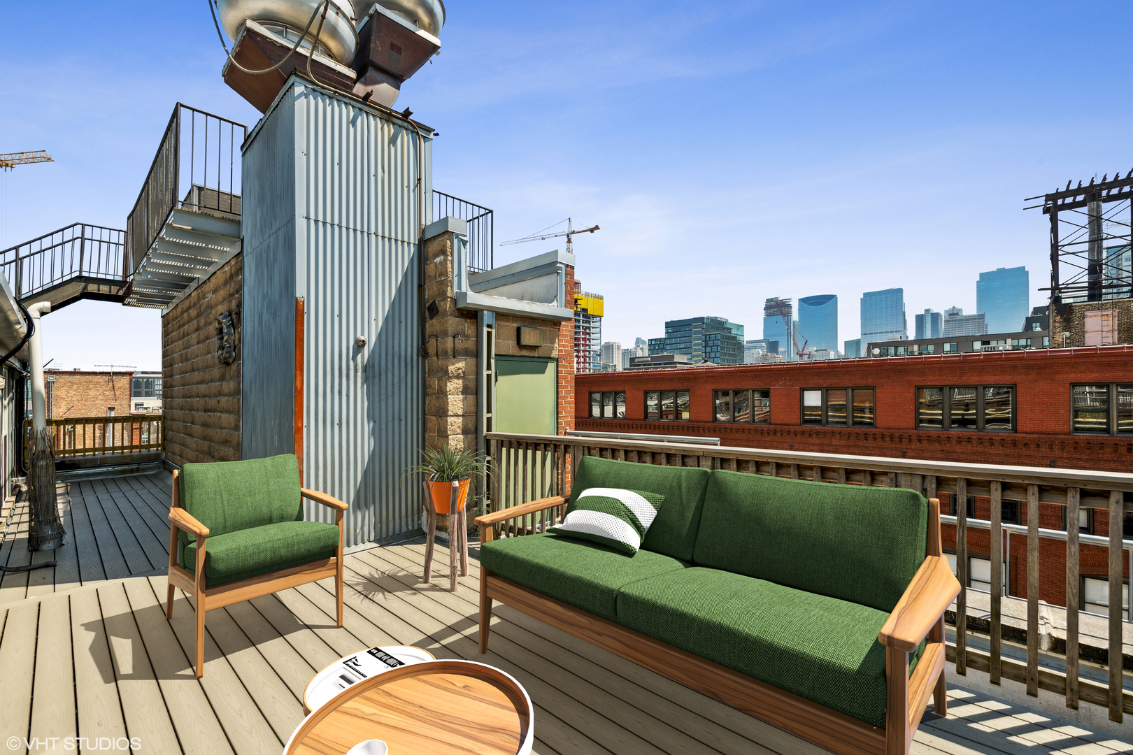 1000 West Washington Boulevard, Unit 513 Chicago, IL 60607 - Photo 22 of 22 a deck with outdoor seating and city view