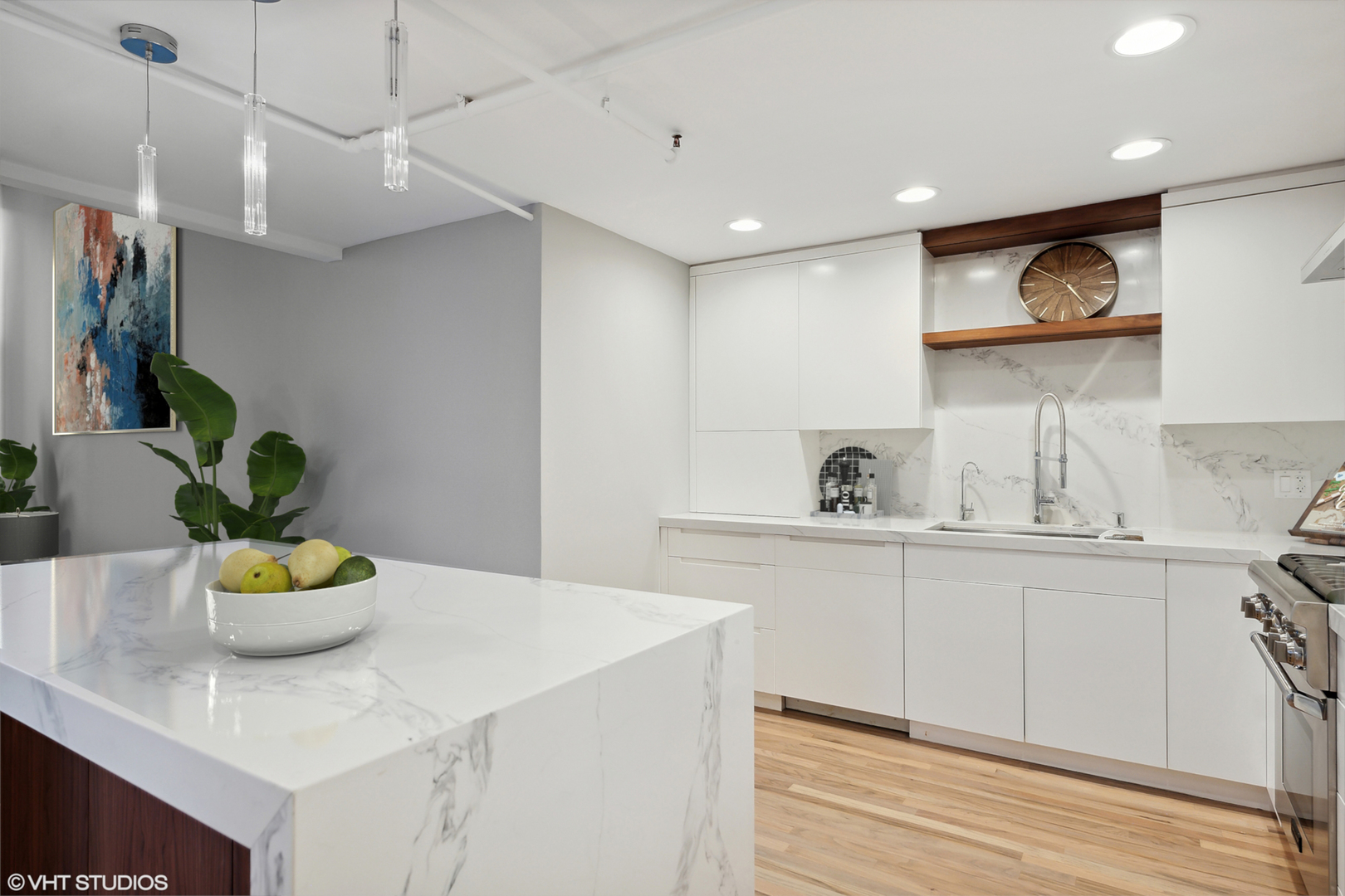 1000 West Washington Boulevard, Unit 513 Chicago, IL 60607 - Photo 4 of 22 a kitchen with a sink a counter space and cabinets