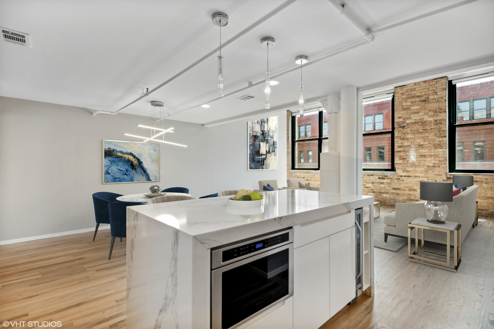 1000 West Washington Boulevard, Unit 513 Chicago, IL 60607 - Photo 7 of 22 a kitchen with a stove and a table