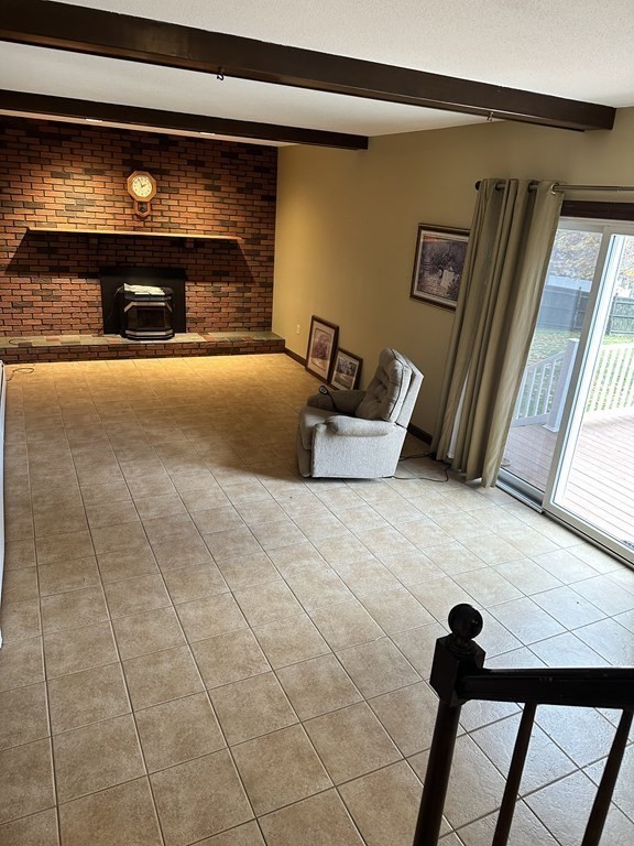 76 Americo Street Ludlow, MA 01056 - Photo 11 of 21 a view of living room with furniture and a flat screen tv