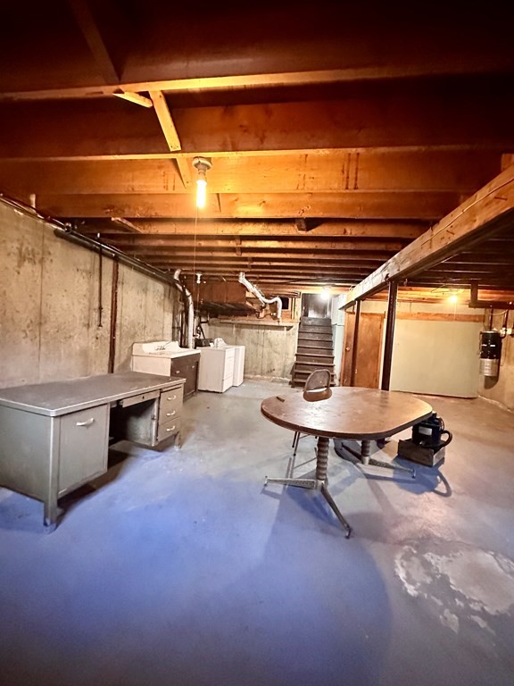 76 Americo Street Ludlow, MA 01056 - Photo 21 of 21 a view of livingroom with furniture and fireplace