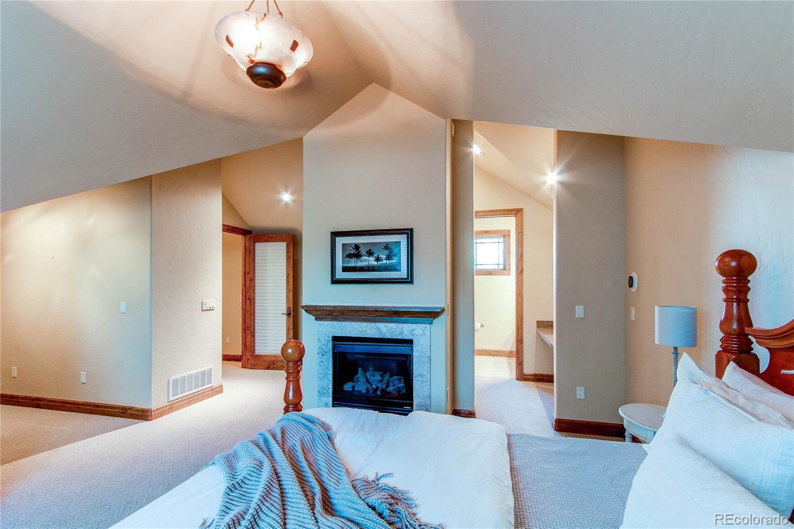 5764 Amber Ridge Drive Castle Pines, CO 80108 - Photo 33 of 50 a living room with furniture and a fireplace