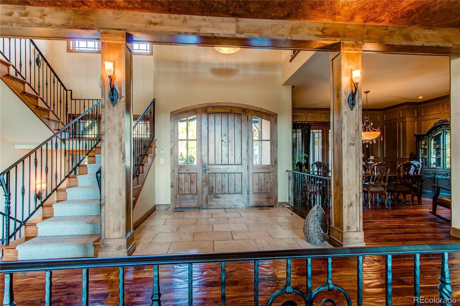 5764 Amber Ridge Drive Castle Pines, CO 80108 - Photo 7 of 50 a view of front door and porch