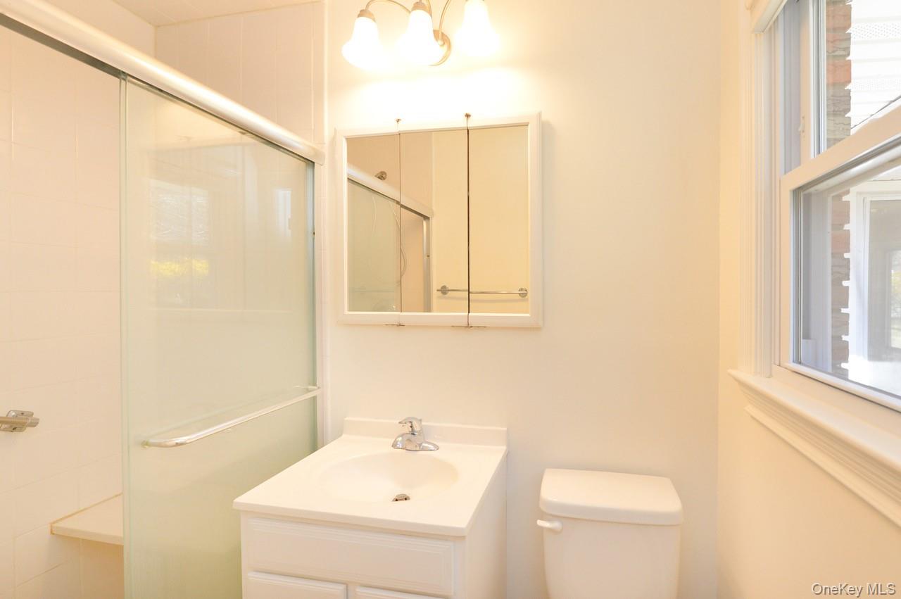 2 Augur Road Airmont, NY 10901 - Photo 29 of 34 a bathroom with a sink a toilet and shower