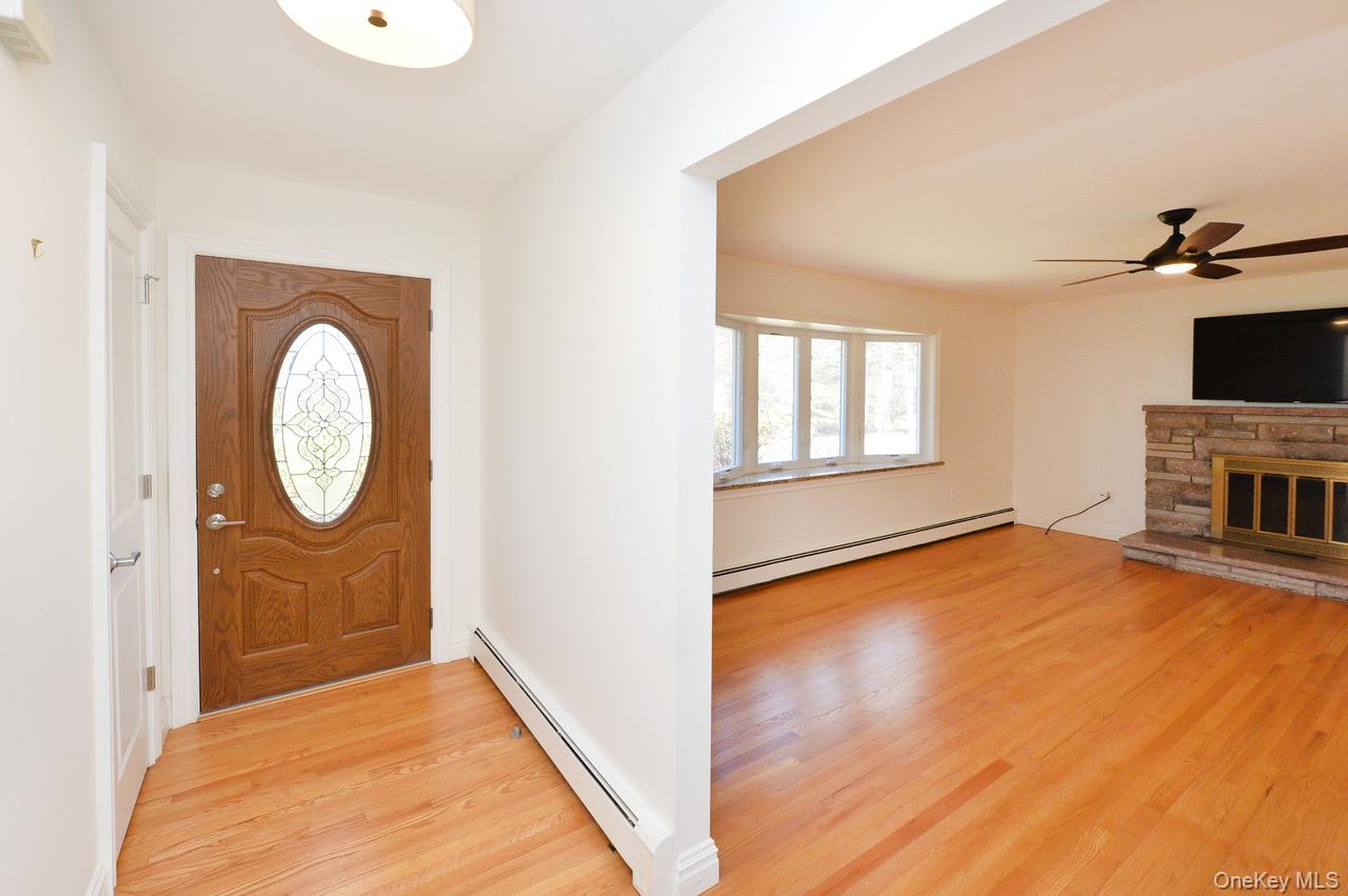 2 Augur Road Airmont, NY 10901 - Photo 30 of 34 a view of a livingroom with wooden floor and a large window