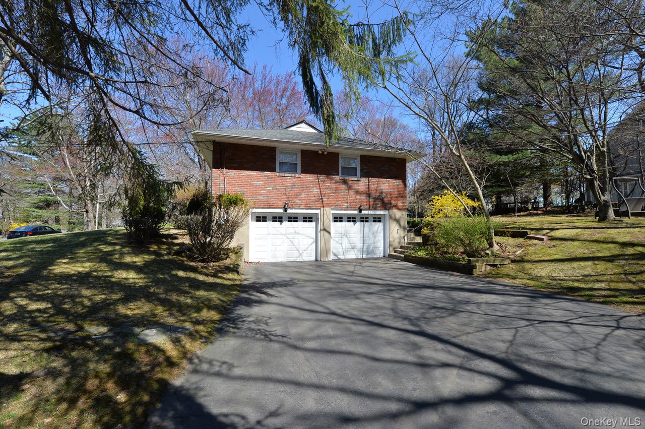 2 Augur Road Airmont, NY 10901 - Photo 4 of 34 a front view of a house with a yard