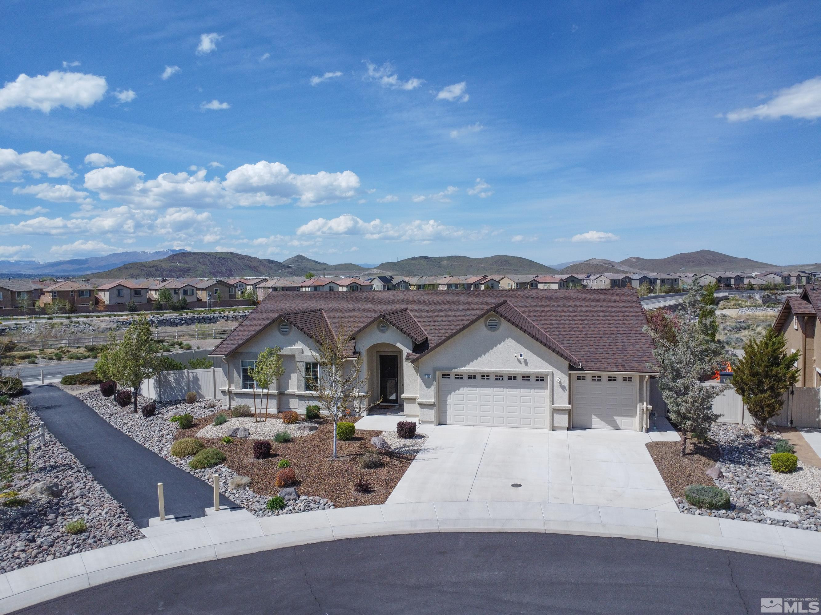2255 Makenna Drive Reno, NV 89521 - Photo 34 of 34 an aerial view of a house with a garden