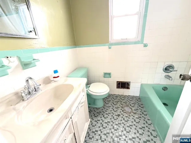 a view of a big room with windows