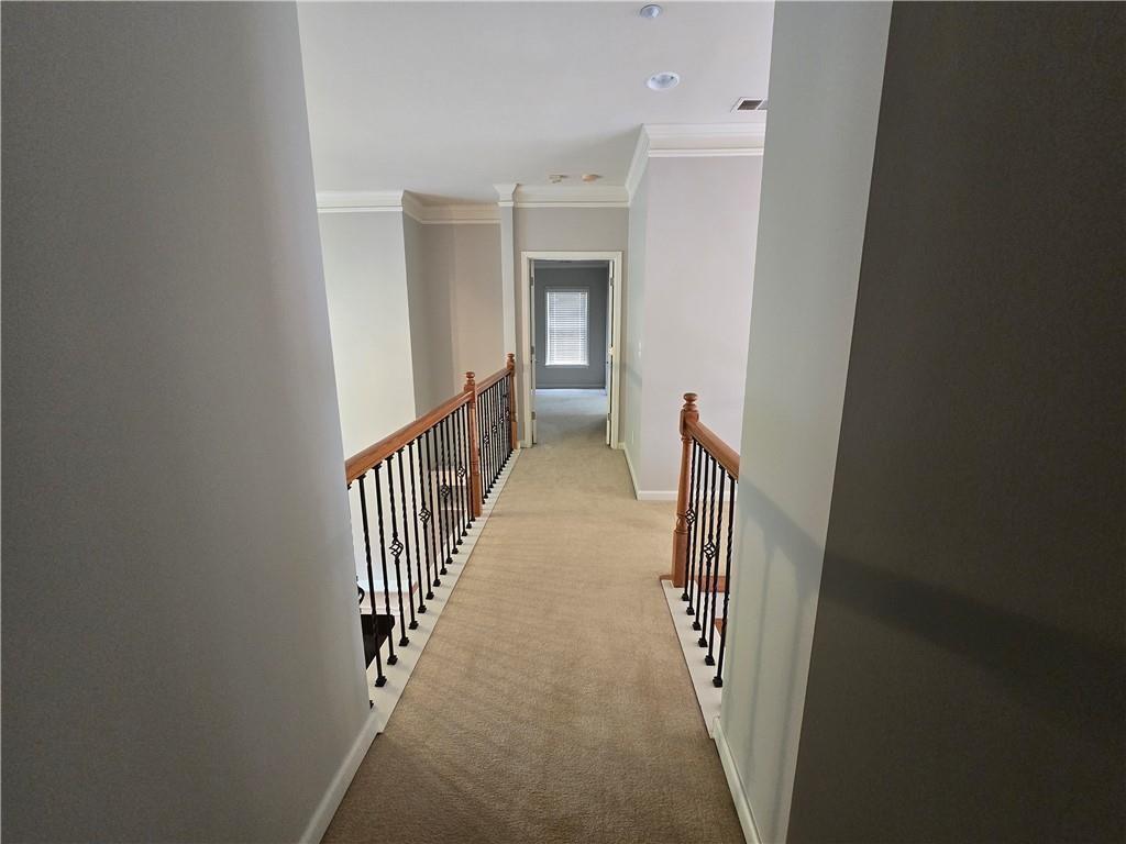 624 Maple Grove Way Marietta, GA 30066 - Photo 11 of 27 a view of a hallway with wooden floor and entryway