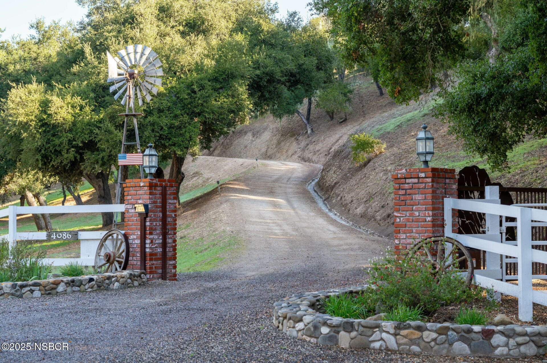 4086 East Oak Trail Road Santa Ynez, CA 93460 - Photo 49 of 57 a backyard of a house with lots of green space