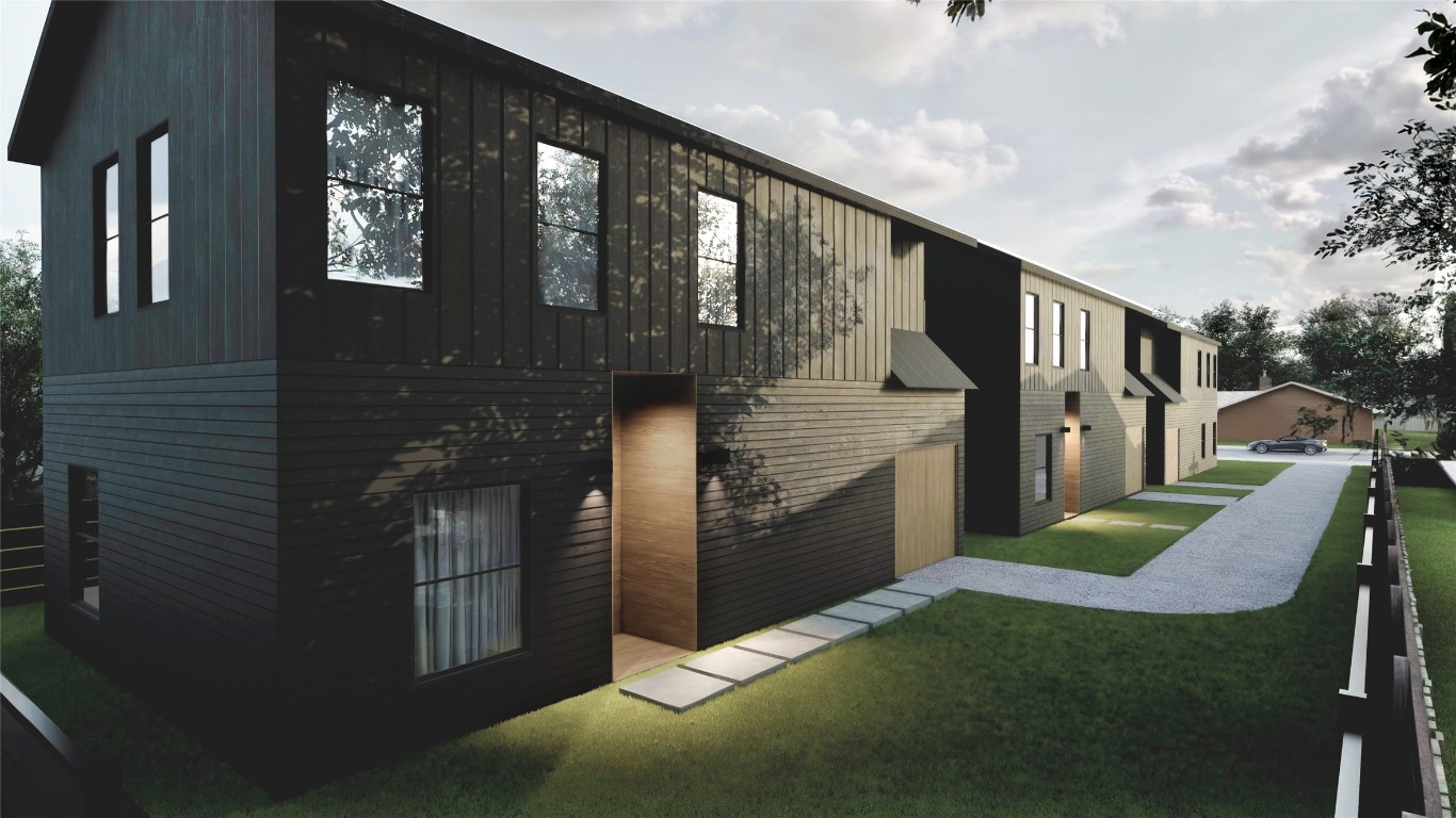 7310 Carver Avenue, Unit 3 Austin, TX 78752 - Photo 1 of 12 View of side of home with a lawn