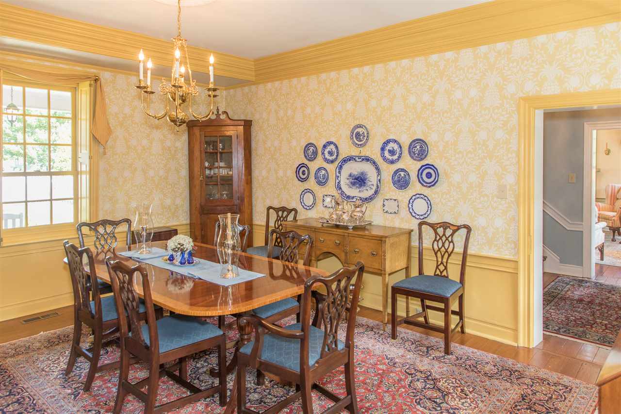 3938 Spring Hill Road Staunton, VA 24401 - Photo 11 of 50 a view of a dining room with furniture and chandelier