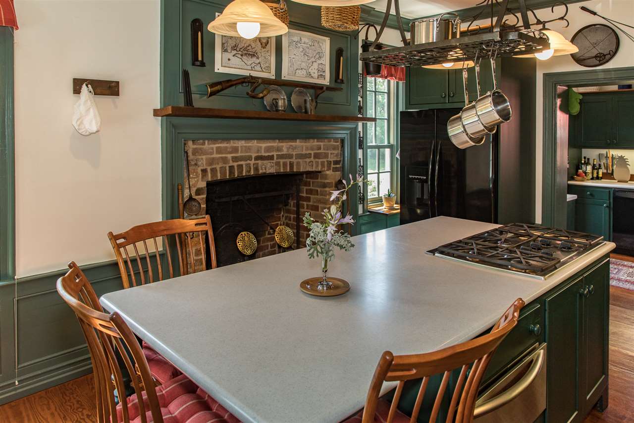 3938 Spring Hill Road Staunton, VA 24401 - Photo 12 of 50 a view of a dining room with furniture and chandelier