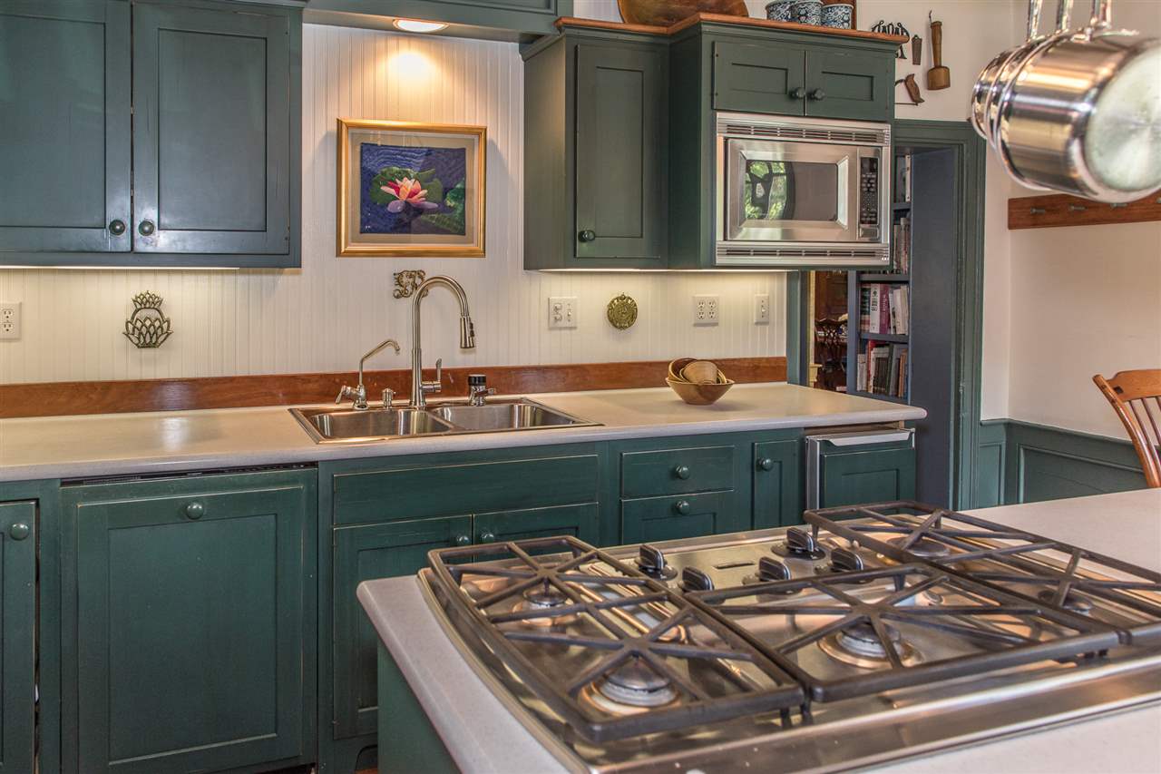 3938 Spring Hill Road Staunton, VA 24401 - Photo 15 of 50 a kitchen with a stove and a sink