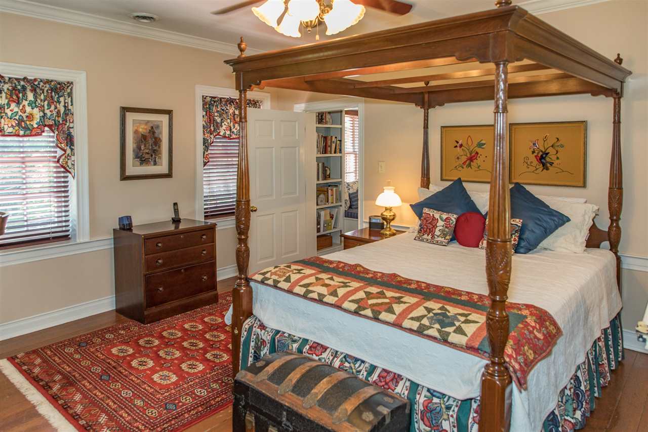 3938 Spring Hill Road Staunton, VA 24401 - Photo 26 of 50 a bedroom with a bed and wooden floor