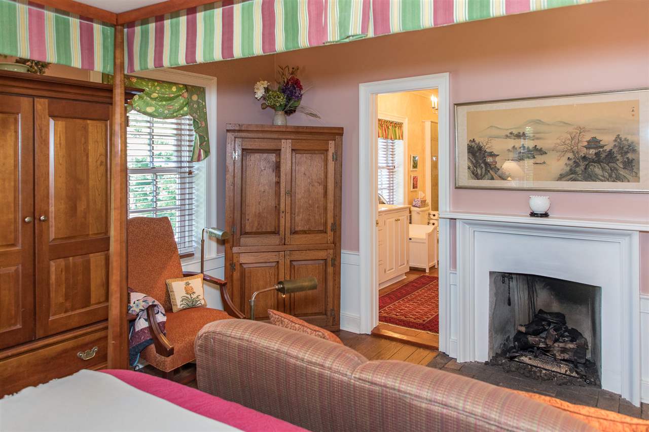 3938 Spring Hill Road Staunton, VA 24401 - Photo 30 of 50 a living room with furniture a window and a fireplace