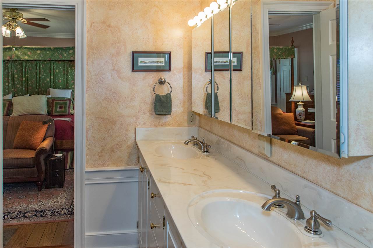 3938 Spring Hill Road Staunton, VA 24401 - Photo 31 of 50 a bathroom with a granite countertop sink and a mirror