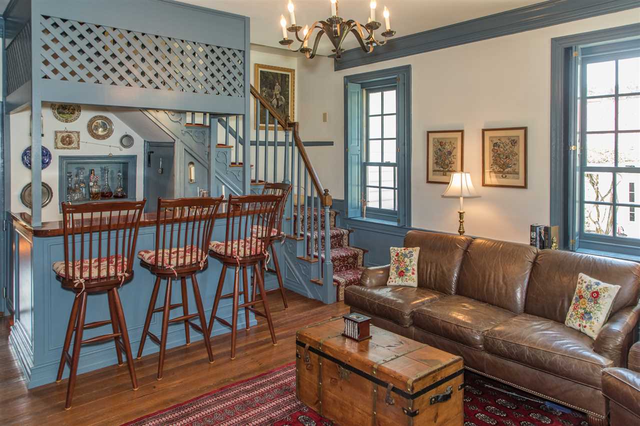 3938 Spring Hill Road Staunton, VA 24401 - Photo 4 of 50 a living room with furniture a dining table and a chandelier