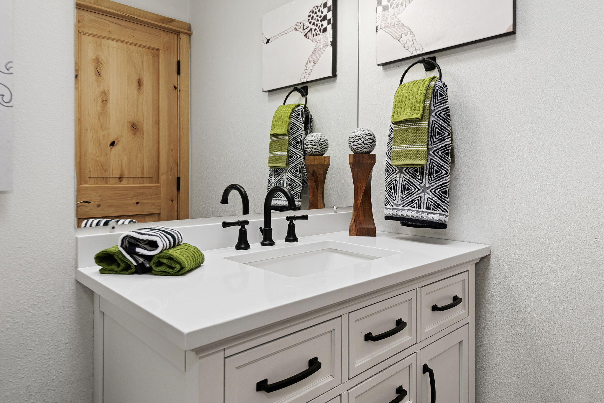 66901 Lance Road Bend, OR 97703 - Photo 40 of 71 a bathroom with a sink and a mirror