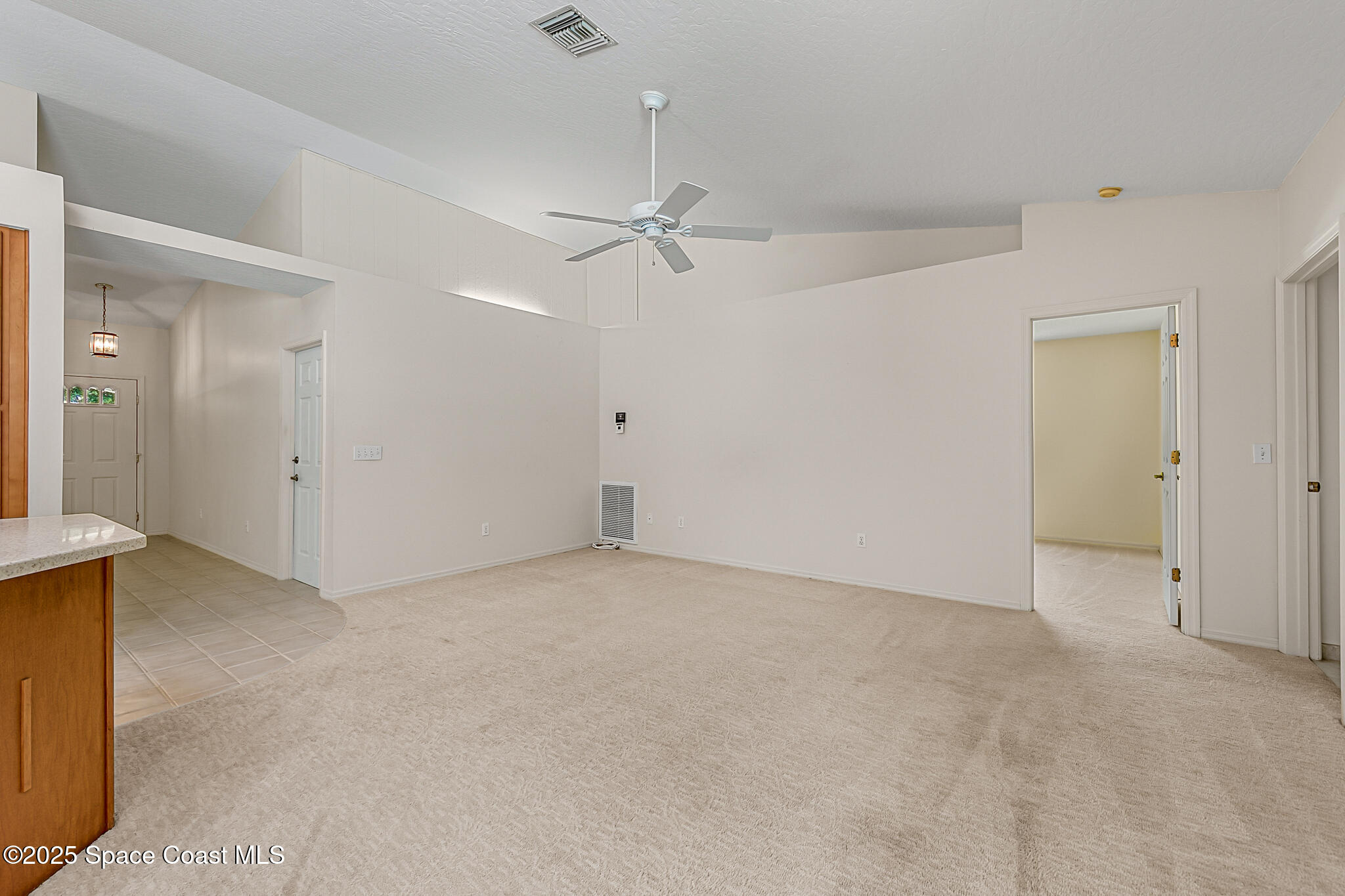 3340 Weber Road Malabar, FL 32950 - Photo 30 of 96 an empty room with fan and a ceiling fan