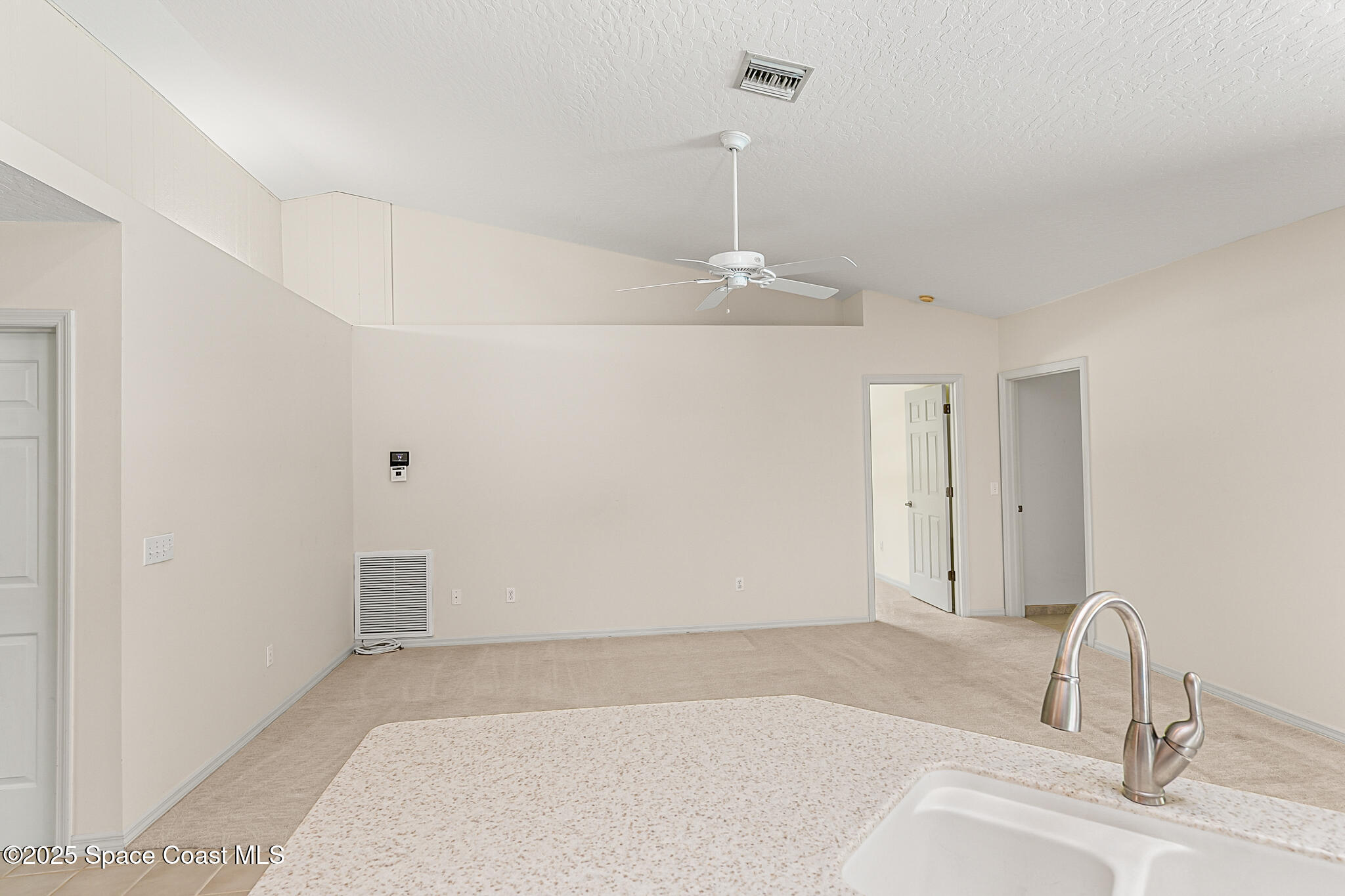 3340 Weber Road Malabar, FL 32950 - Photo 34 of 96 a view of a room with a sink and chandelier