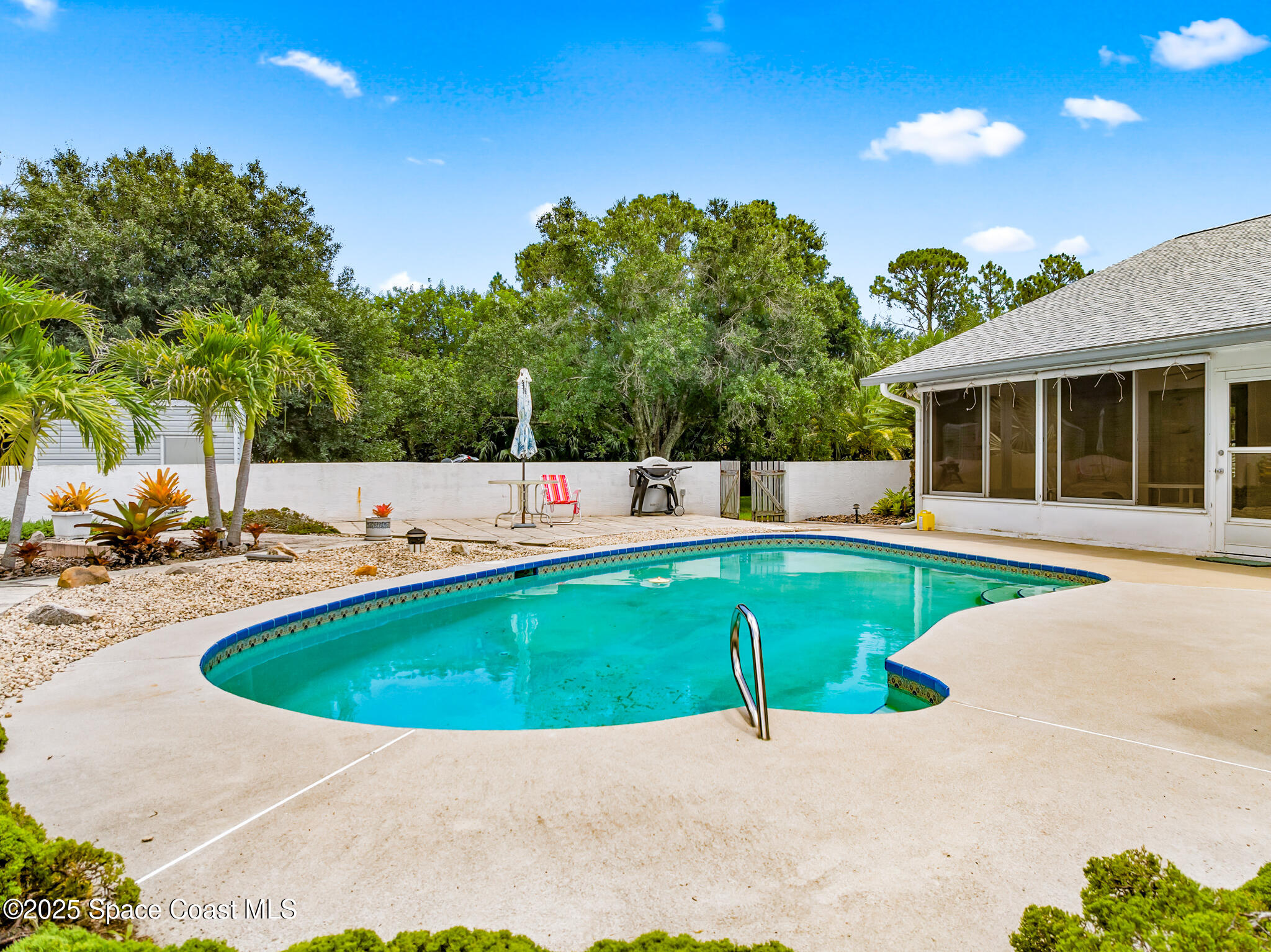 3340 Weber Road Malabar, FL 32950 - Photo 65 of 96 a view of outdoor space with swimming pool and furniture