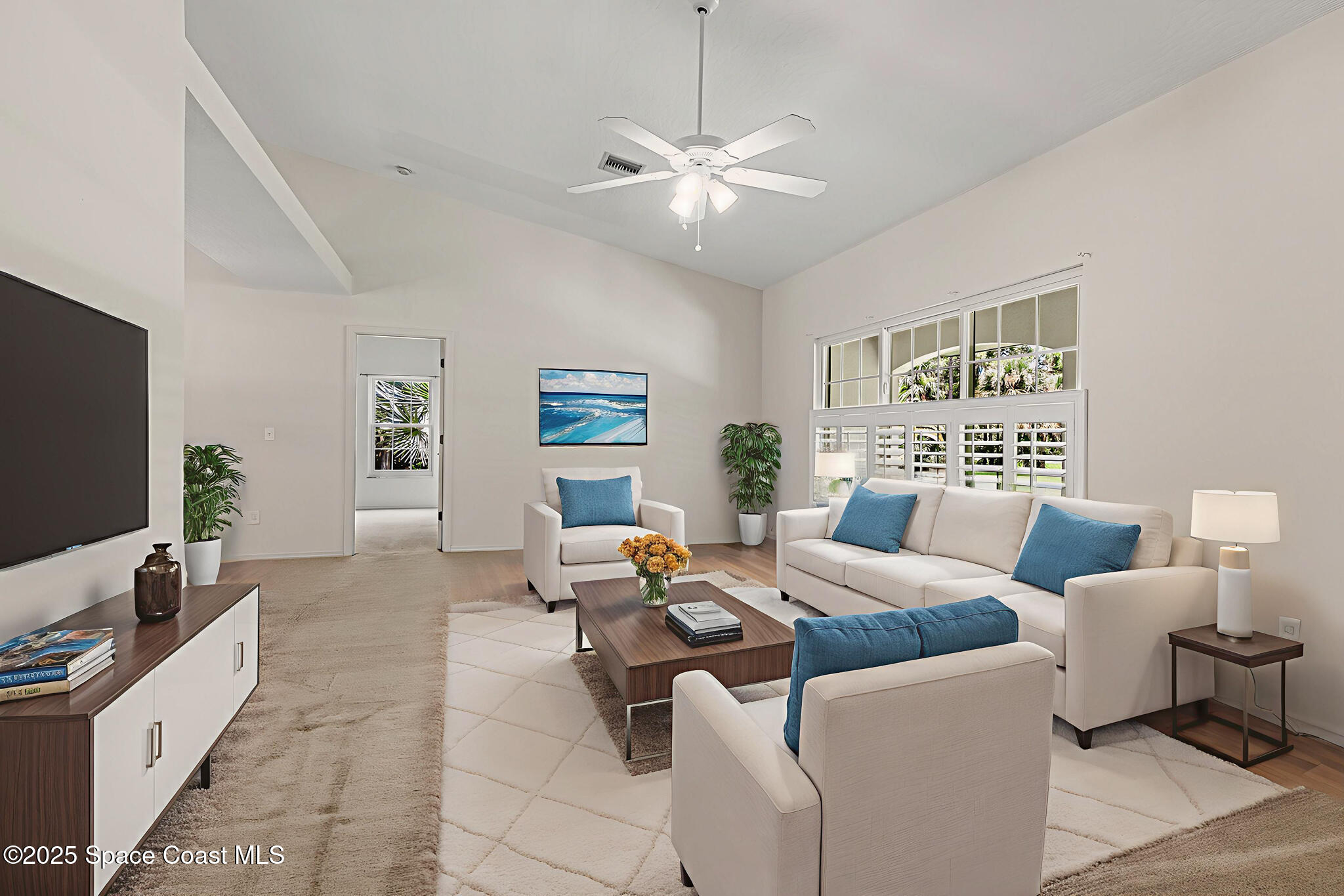 3340 Weber Road Malabar, FL 32950 - Photo 7 of 96 a living room with furniture and a flat screen tv