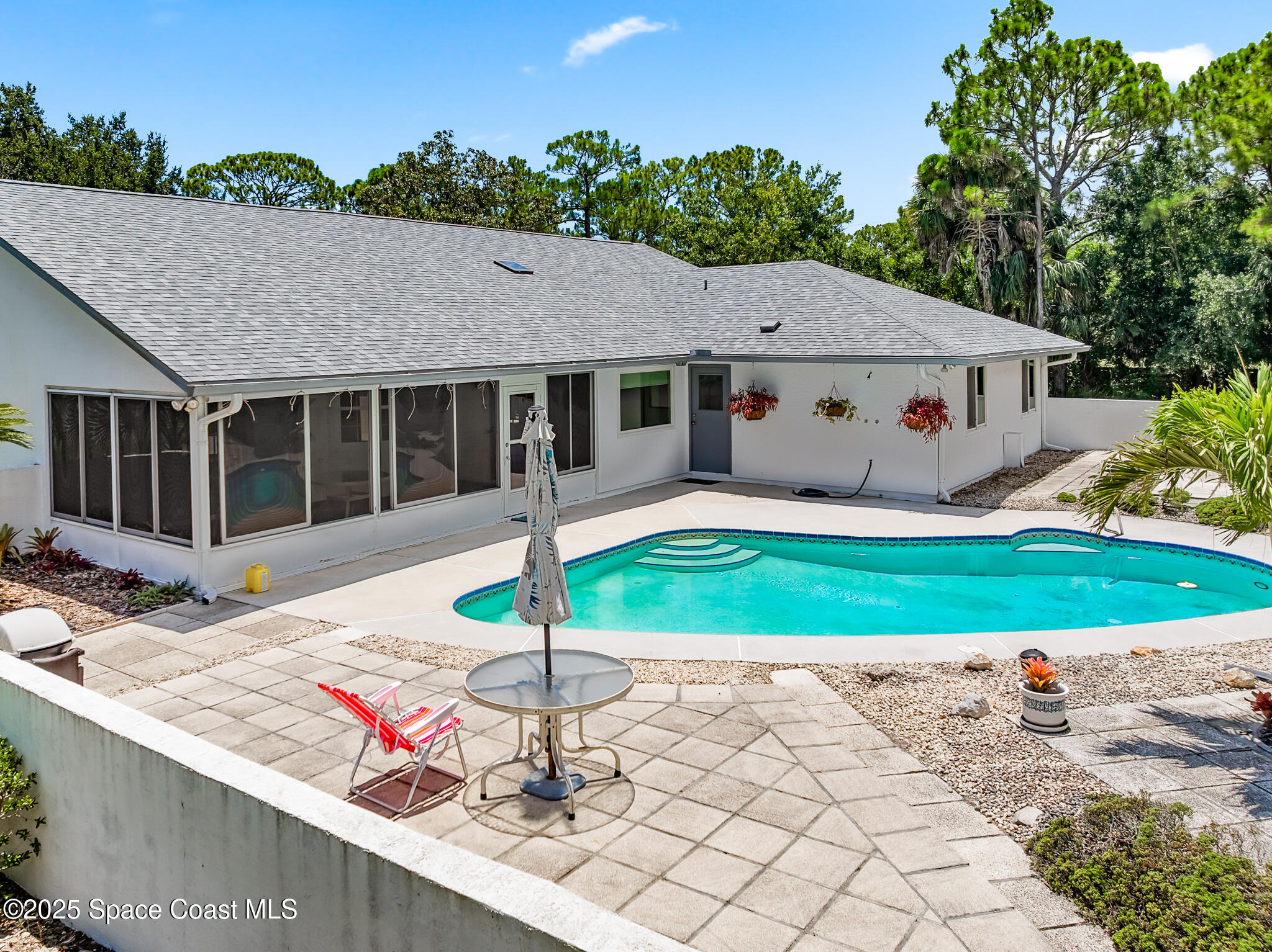 3340 Weber Road Malabar, FL 32950 - Photo 74 of 96 a front view of a house with garden