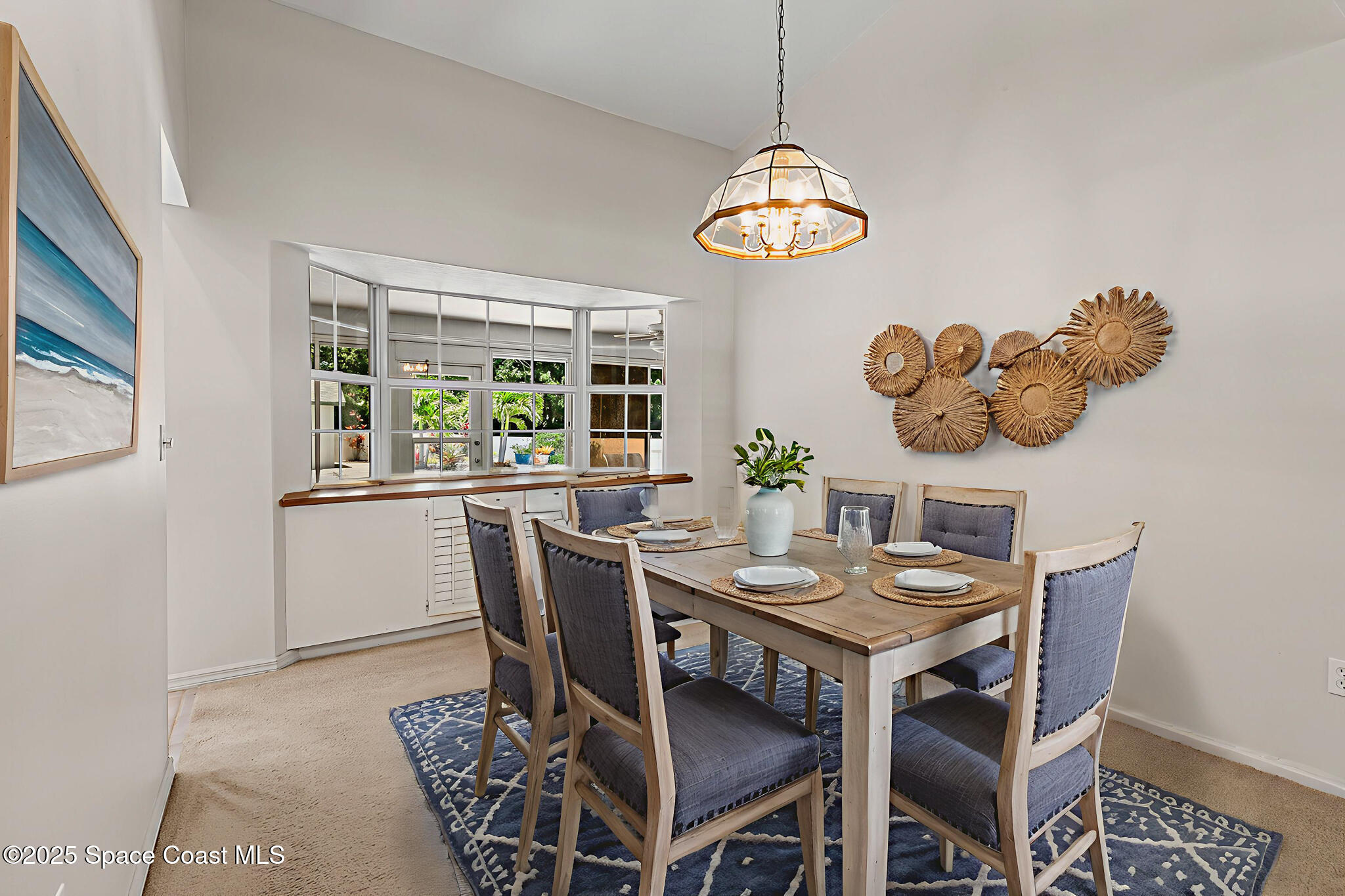 3340 Weber Road Malabar, FL 32950 - Photo 8 of 96 a view of a dining room with furniture window and outside view