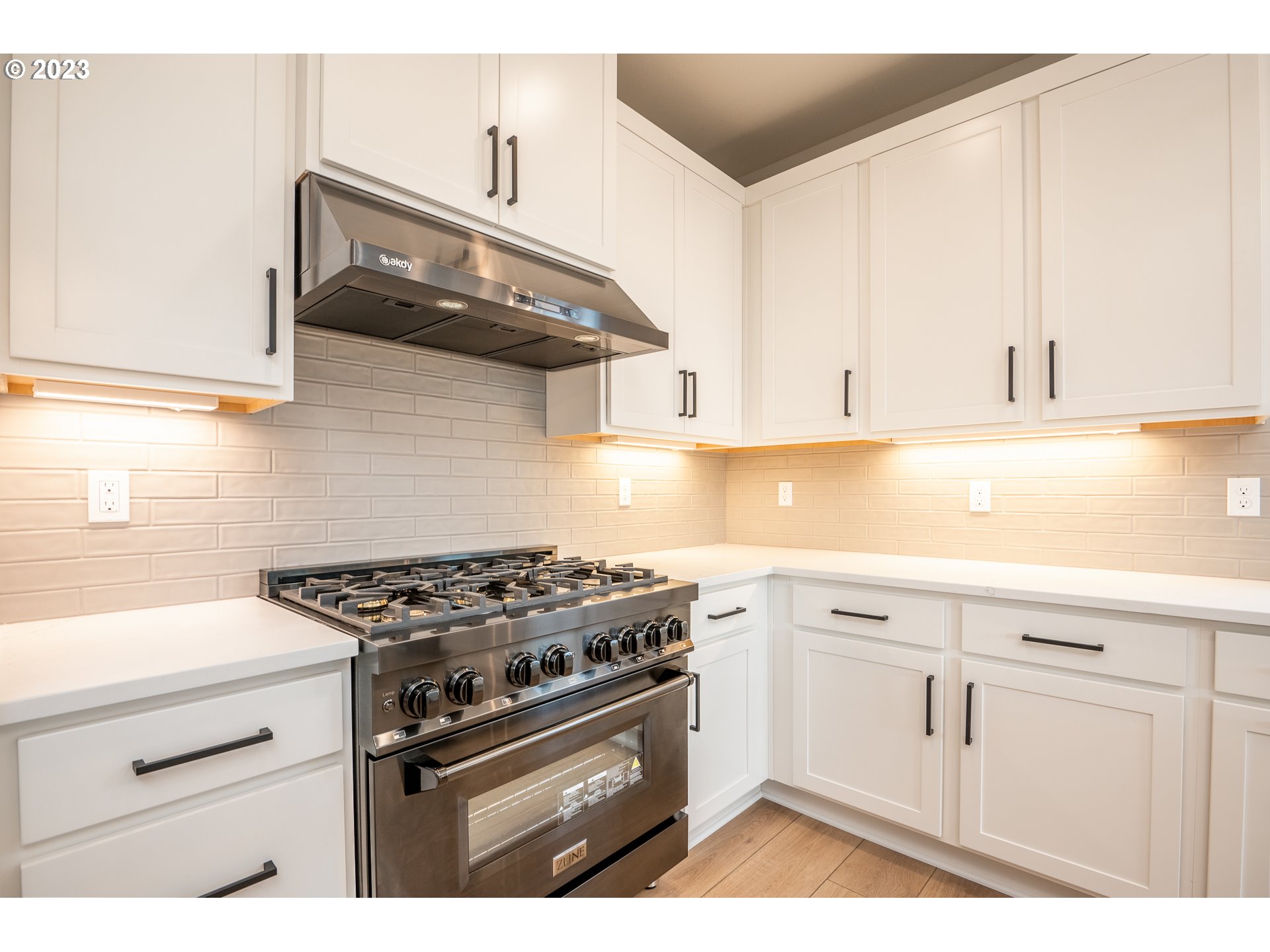 37772 Southeast Olson Street Sandy, OR 97055 - Photo 18 of 32 a kitchen with white cabinets and appliances