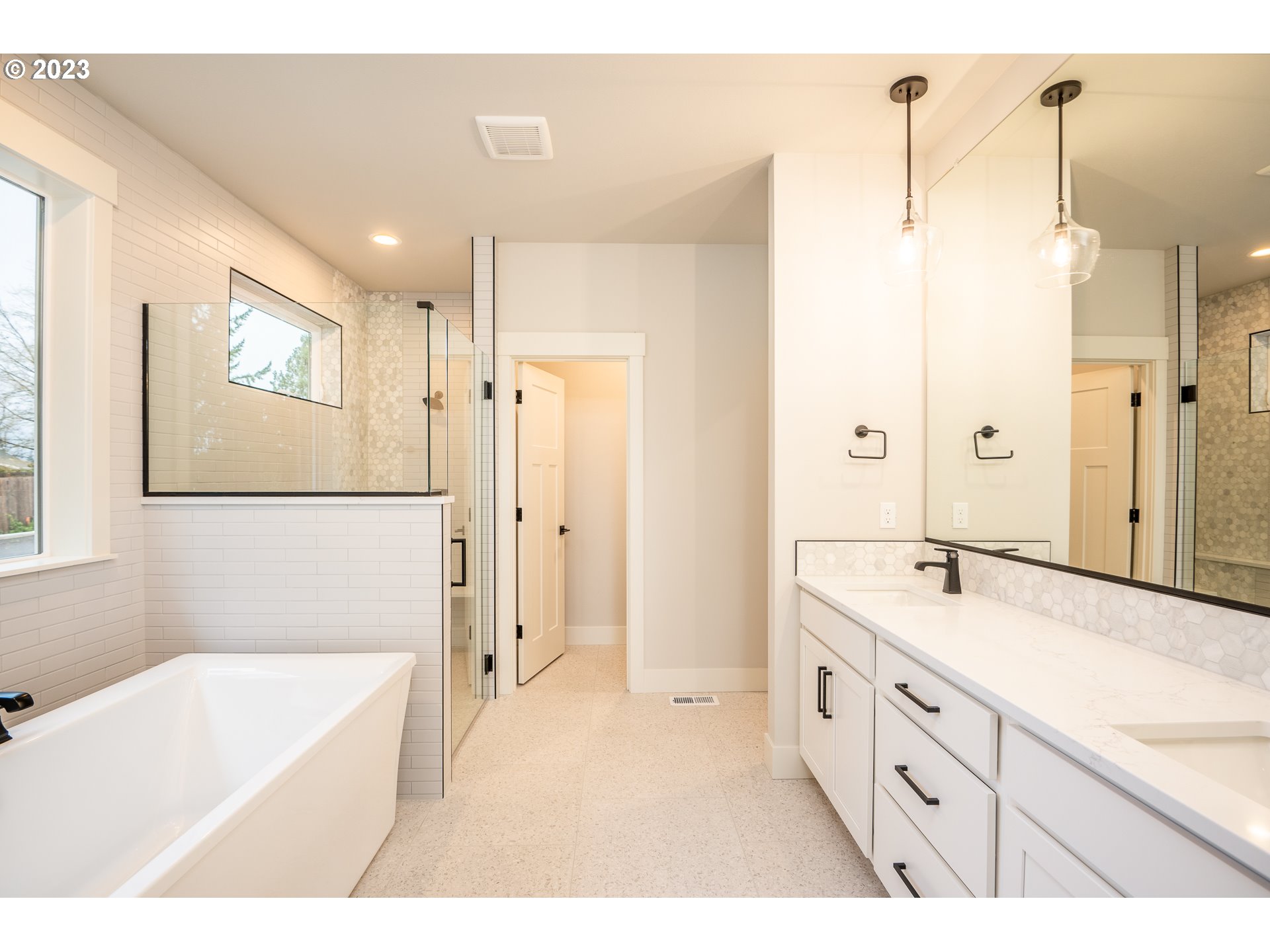 37772 Southeast Olson Street Sandy, OR 97055 - Photo 25 of 32 a bathroom with a tub sink shower and mirror