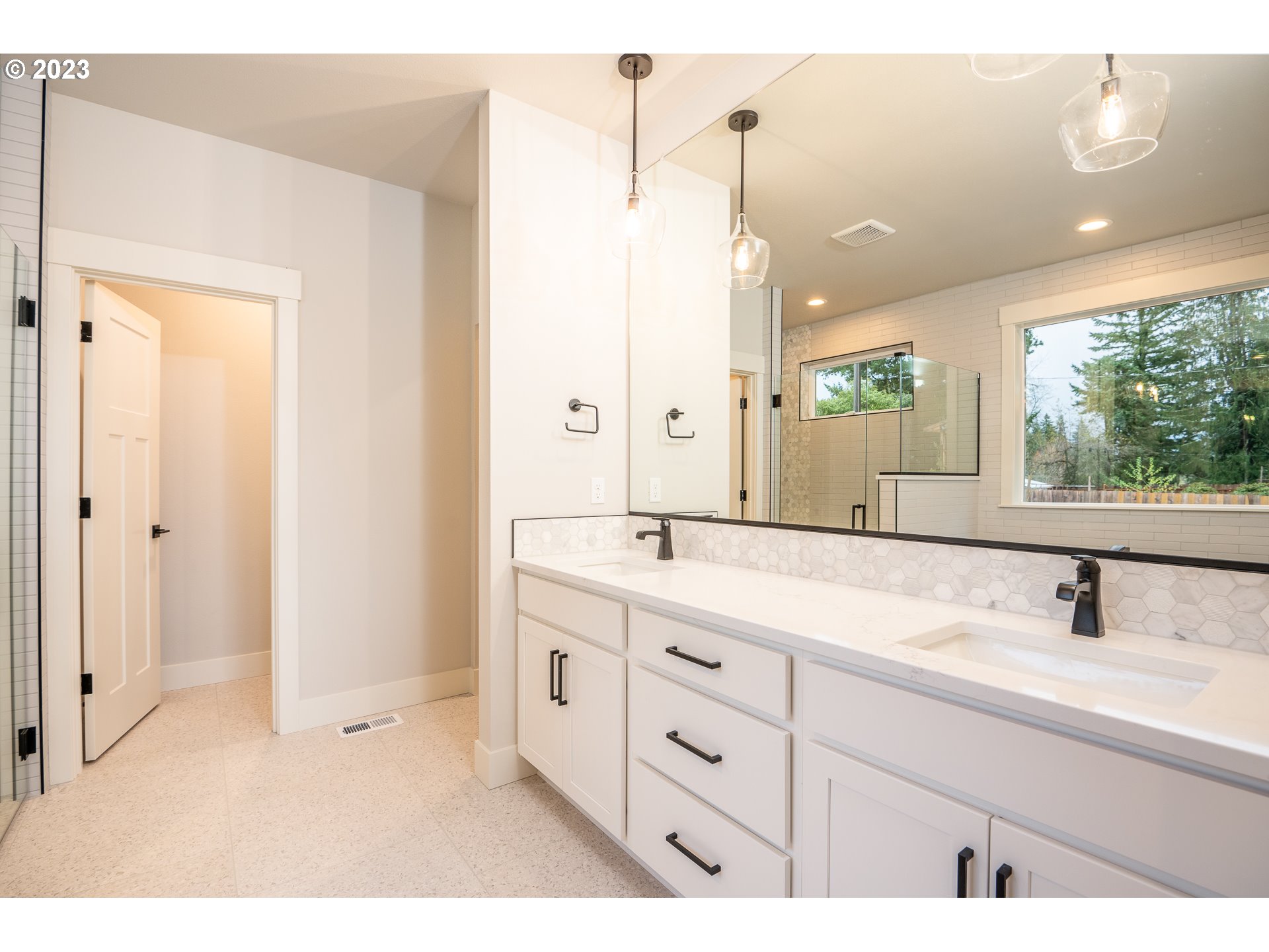 37772 Southeast Olson Street Sandy, OR 97055 - Photo 26 of 32 a bathroom with a double vanity sink mirror and double