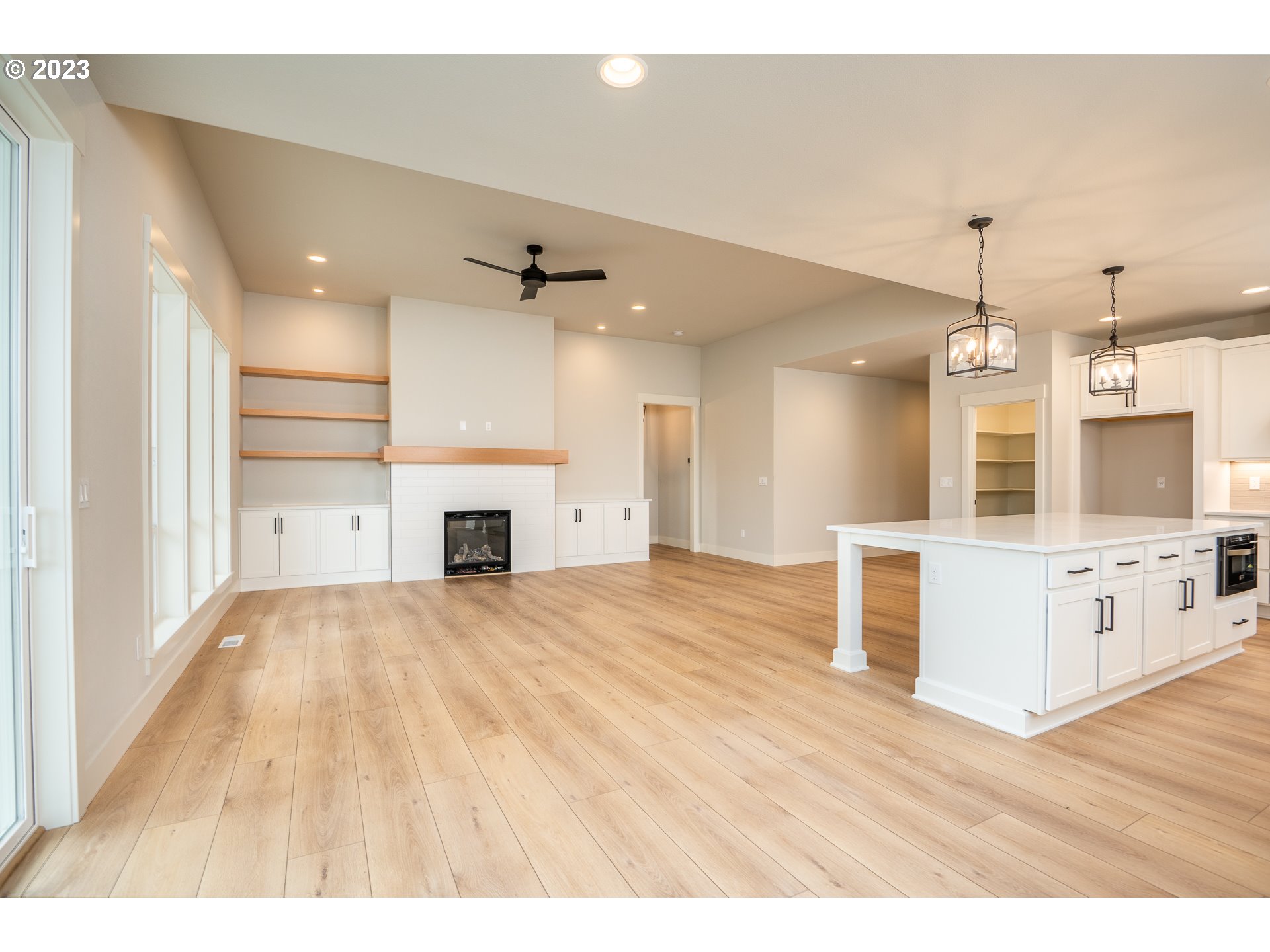 37772 Southeast Olson Street Sandy, OR 97055 - Photo 5 of 32 a view of a kitchen with wooden floor and a sink