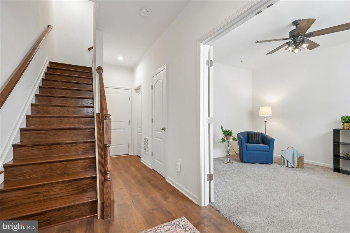 1813 Iris Lane Hanover, MD 21076 - Photo 3 of 20 a view of a hallway view with staircase