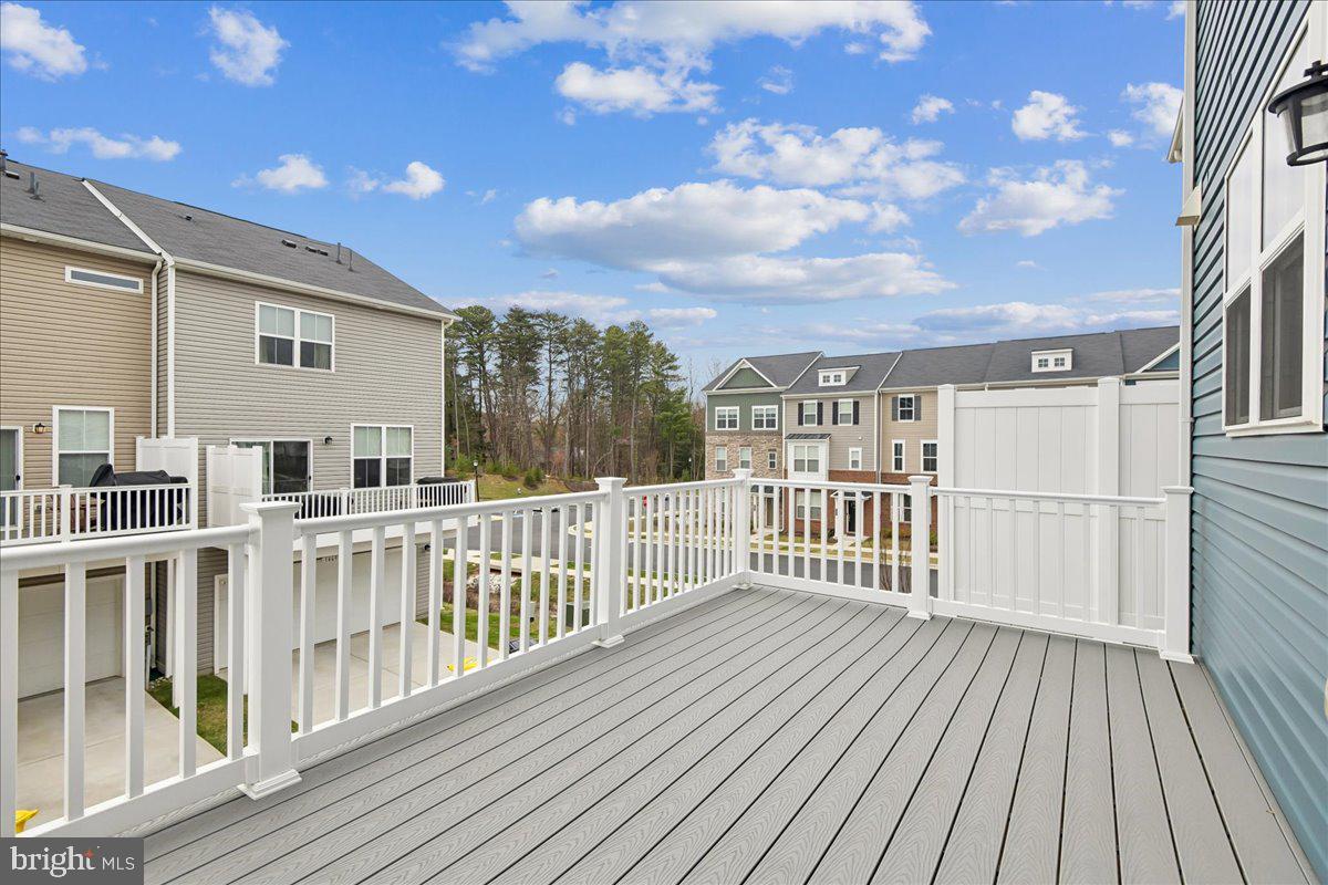 1813 Iris Lane Hanover, MD 21076 - Photo 9 of 20 a view of a house with wooden deck